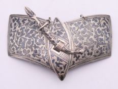 A Russian silver niello buckle with small dagger pin. 4 cm wide. 42.5 grammes.