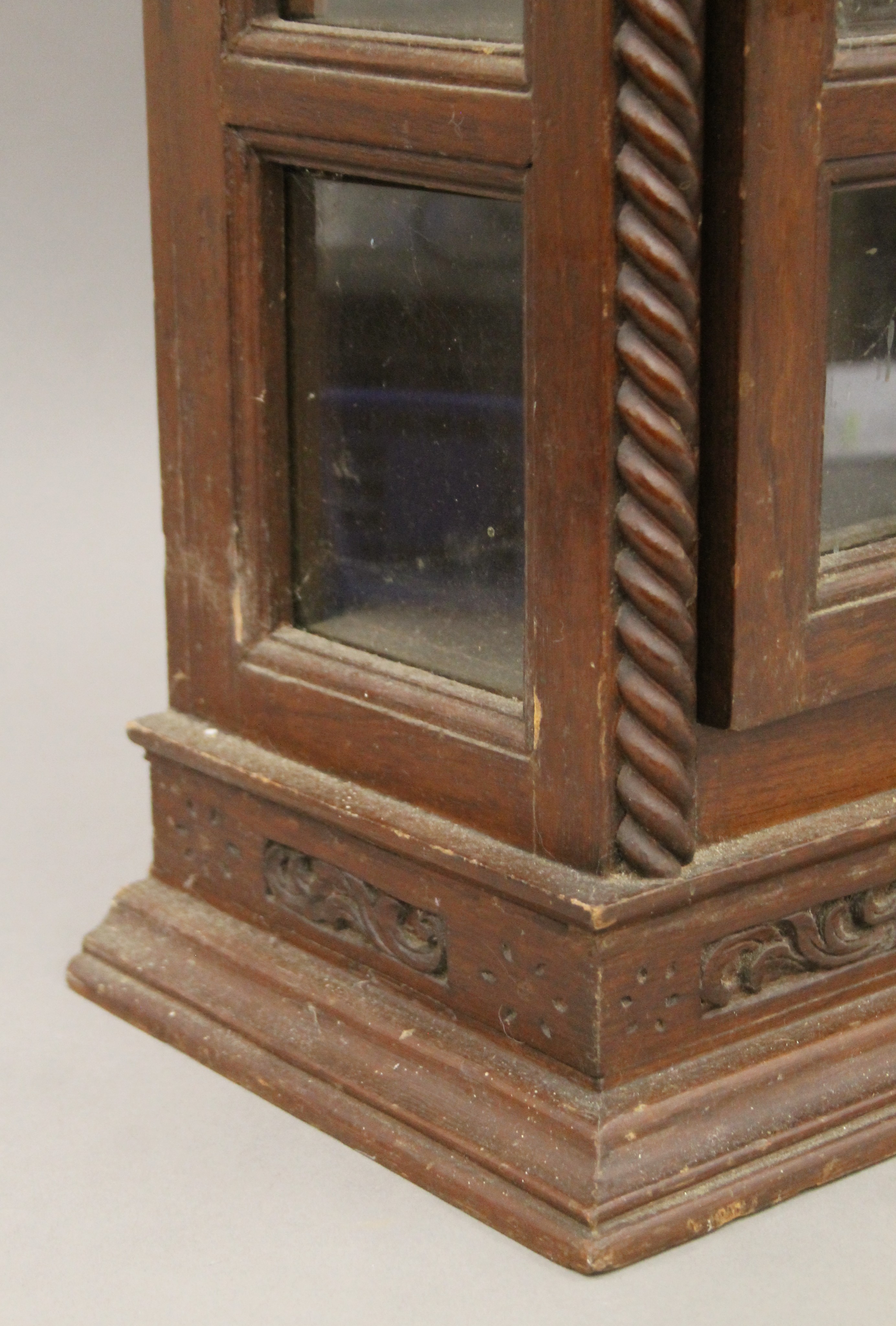 An Eastern carved hardwood glazed display cabinet. 68 cm high. - Image 4 of 4