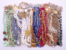 A box of miscellaneous jewellery to include a silver gilt and green enamel necklace stamped NORWAY