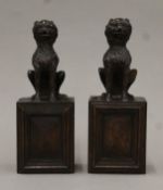 A pair of 19th century carved oak lions. Each 22.5 cm high.