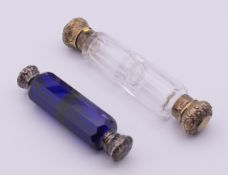 Two Victorian double-ended glass scent bottles. Clear glass bottle 13.