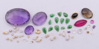 A quantity of various gemstones. Largest 27 mm x 18 mm.