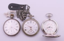 A silver pocket watch and two other pocket watches. Silver pocket watch 5 cm diameter.