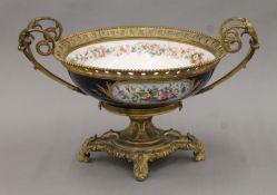 A 19th century Continental ormolu-mounted Sevres style painted porcelain centre bowl. 41 cm wide.
