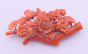 A Victorian coral flower brooch. 6.5 x 3 cm.