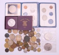 A quantity of antique and foreign coins to include a boxed 1951 Festival of Britain crown,