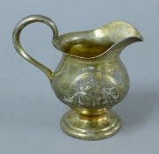 A Russian silver cream jug. 10.5 cm high. 127.2 grammes.