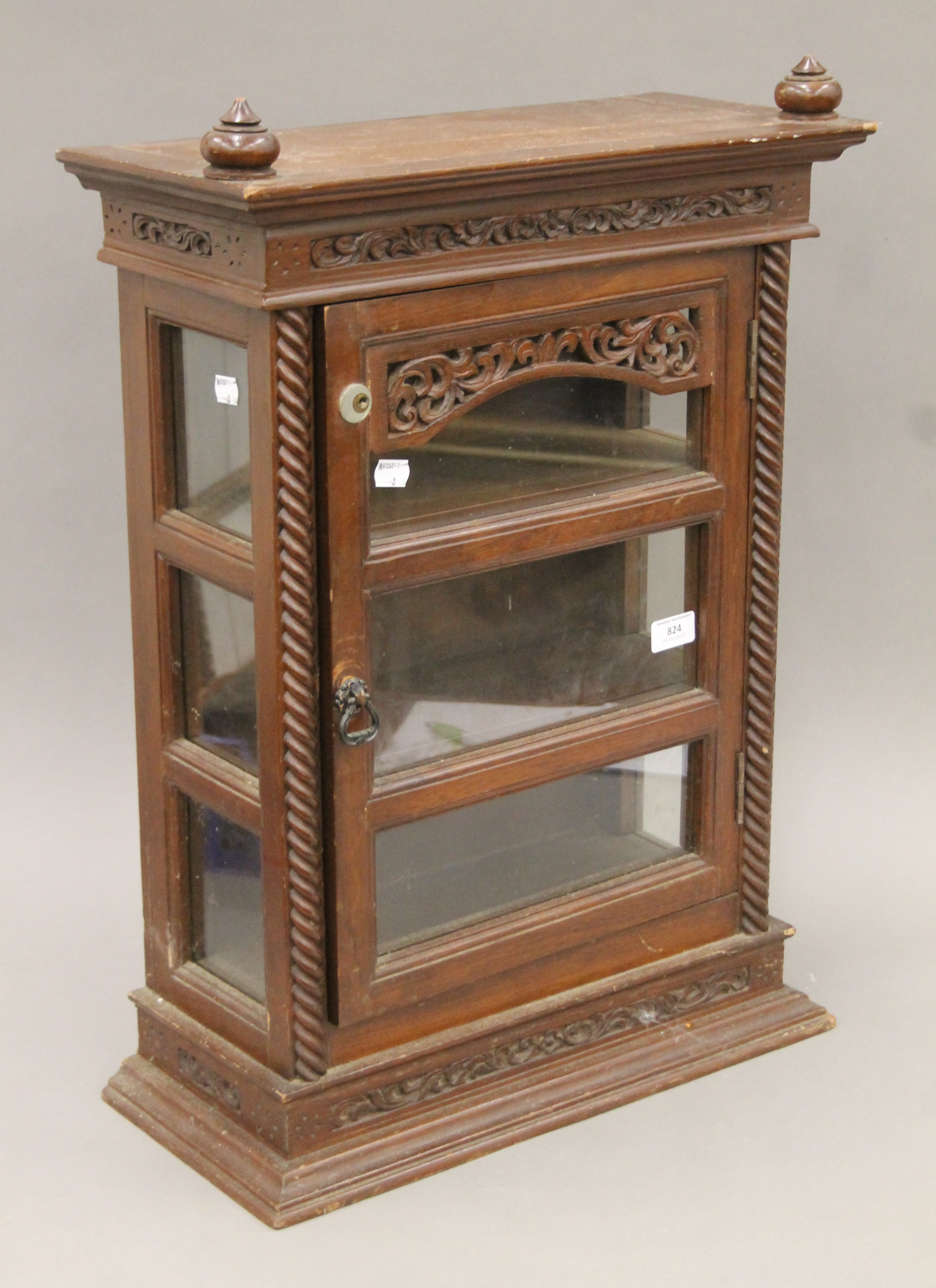 An Eastern carved hardwood glazed display cabinet. 68 cm high. - Image 2 of 4