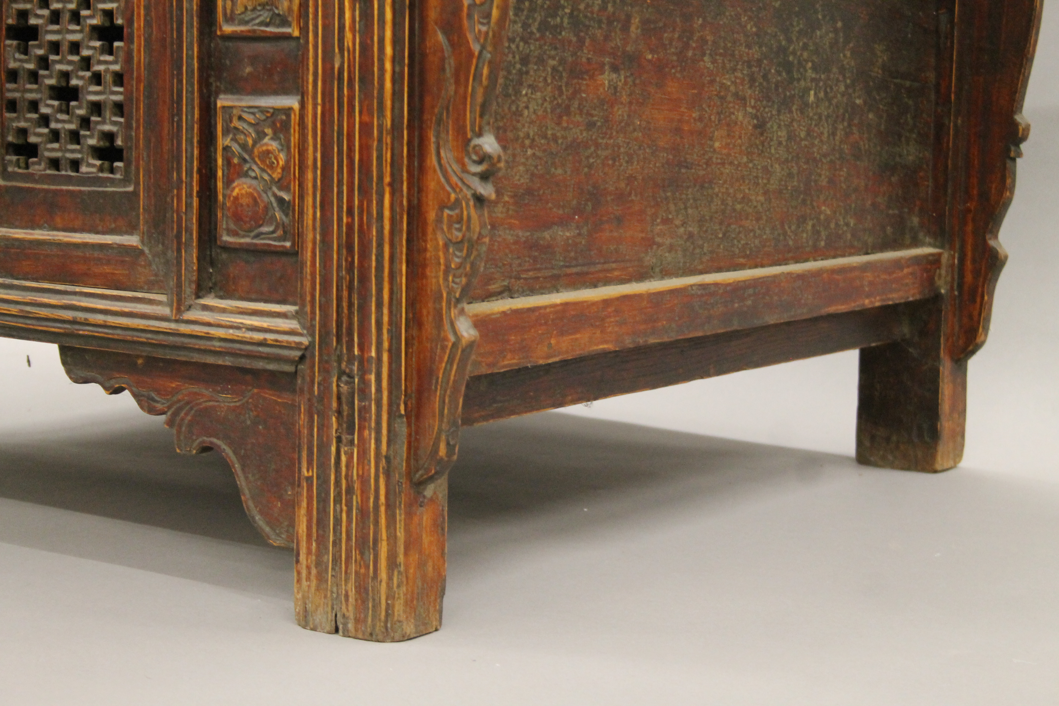 A 19th century Chinese elm side cupboard. 111 cm wide x 85 cm high x 79 cm deep. - Image 8 of 8