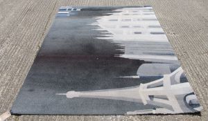 A rug depicting various Parisian view,