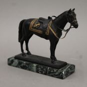 A limited edition painted spelter sculpture of a horse,