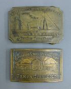 Two bronze buckles. The larger 9 cm wide.