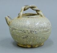 A Chinese faux marble pottery teapot. 9 cm high.