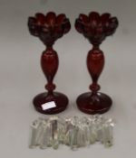 A pair of Victorian ruby glass lustres. Each 27.5 cm high.