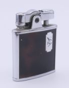 A boxed Ronson De-Light lighter. 5 cm high.