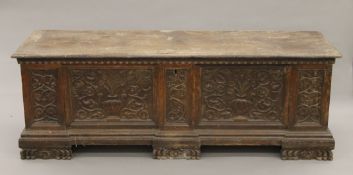 An 18th century Italian walnut cassone. 187 cm long.