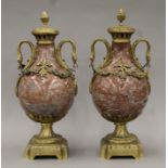 A pair of bronze-mounted marble cassolettes. Each 47 cm high.