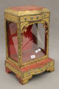 An Eastern gilt-painted table cabinet. 50 cm high.