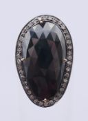 A silver gilt and diamond dress ring. Setting 27 mm high, ring size M/N.
