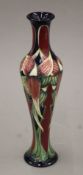 A boxed Moorcroft vase. 30.5 cm high.