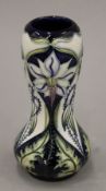 A boxed Moorcroft vase. 15.5 cm high.