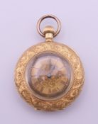 An 18 gold ladies' open faced pocket watch, inscribed 'To Treasa with love Mick Xmas '88,