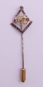 An unmarked 9 ct gold Masonic stickpin, cased. 6 cm long. 1.6 grammes total weight.