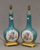 A pair of porcelain table lamps. Each 51 cm high.