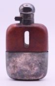 A James Dixon & Son small leather-clad silver plate mounted hip flask. 10.5 cm high.