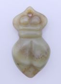 A jade pendant, possibly Maori. 5.8 cm high.
