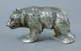 An 800 silver bear. 13 cm long. 238.8 grammes.