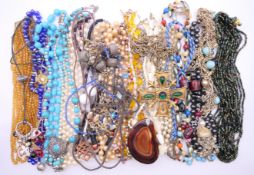 A quantity of miscellaneous costume jewellery, to include bead necklaces, necklaces, watches,