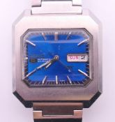 A Seiko 5 DX 6106-5480 day/date blue dial gentlemen's wristwatch. Case 36 mm wide.