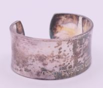A Tiffany and Co silver wide cuff bangle/bracelet. 3 cm high, 6 cm internal diameter.