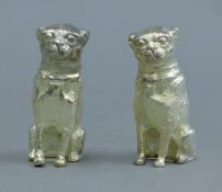 A pair of silver-plated peppers, each formed as a pug. Each 6.5 cm high.
