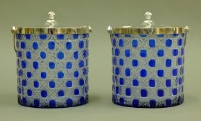 A pair of biscuit barrels. Each 17 cm high excluding handles.