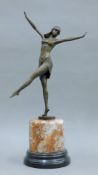 An Art Deco-style bronze of a dancing girl on marble plinth base. 49 cm high.