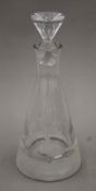 A glass decanter etched with game birds. 32 cm high.