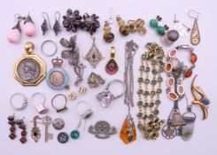 A quantity of mixed jewellery to include earrings, amber jewellery, rings, necklace, pendants,