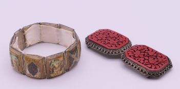 A cinnabar and white metal buckle and a panel bracelet depicting Persian scenes. Each buckle 4.