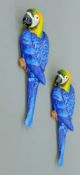 A pair of iron wall-hanging parrots. Each 34 cm high.