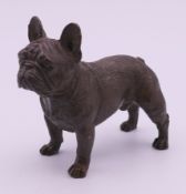 A bronze model of a French bulldog. 6.5 cm high.