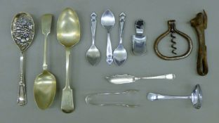 A quantity of various cutlery, including a silver butter knife, a Bully Beef tin opener,