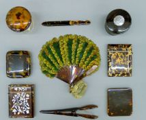 A quantity of various tortoiseshell items, including card cases, trinket box, a fan, etc.