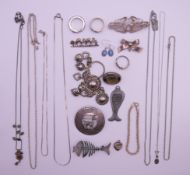 A quantity of silver and white metal jewellery to include, chains, bracelets, two llama brooches,
