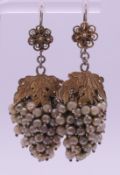 A pair of silver gilt grape cluster earrings. 5 cm high including suspension loop.