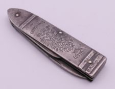 A German WW I silver penknife inscribed 'Das Geheimnis von Luttich' and 42 cm BRUMMER. 8.
