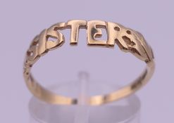 A 9 ct gold 'SISTER' ring. Ring size R/S. 1.6 grammes.