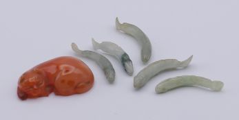 Five jade fish and an agate cat. Cat 4.5 cm long.