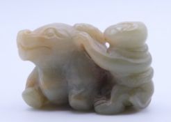 A Chinese jade of a man and water buffalo. 3 cm high.